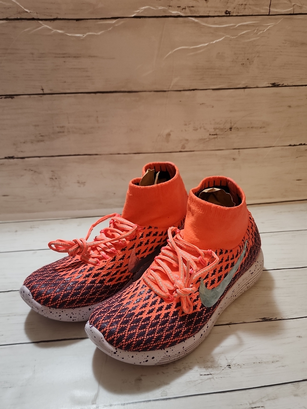 Nike Orange and Black Flyknit High-Top Sneakers with Light Blue Swoosh